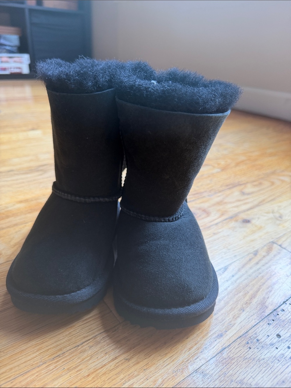 UGG Kids Mini Bailey Bow Black Cozy Winter Boots with Faux Fur Lining